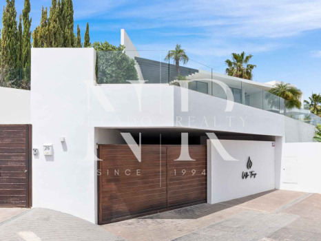 Elegante villa con vistas al mar en La Alquería, Benahavís en venta