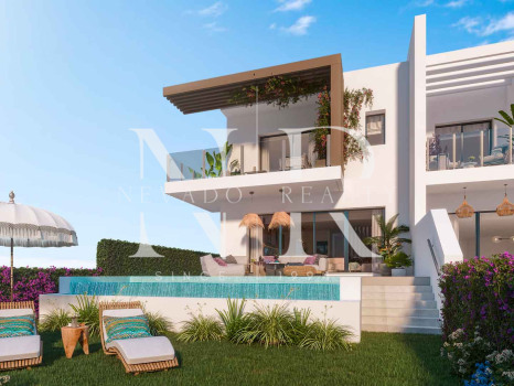 Développement de maisons de ville à Mijas Costa avec vue sur la mer en première ligne de golf en cours de construction