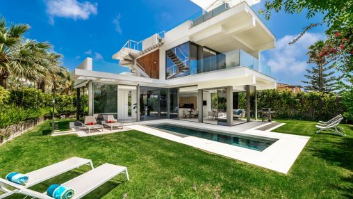 Modern beachside luxury villa with sea views