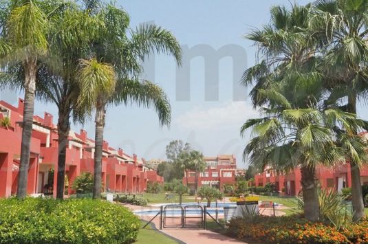 Spacious east facing 5 bedroom townhouse in the complex of Villas de Paniagua with communal gardens and pools.