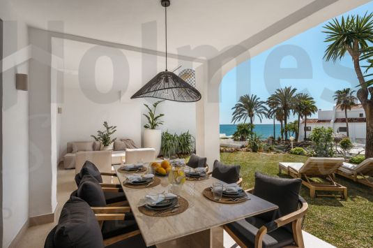 Unique opportunity to acquire a renovated ground floor apartment with direct access to one of the most exclusive beaches of Marbella.