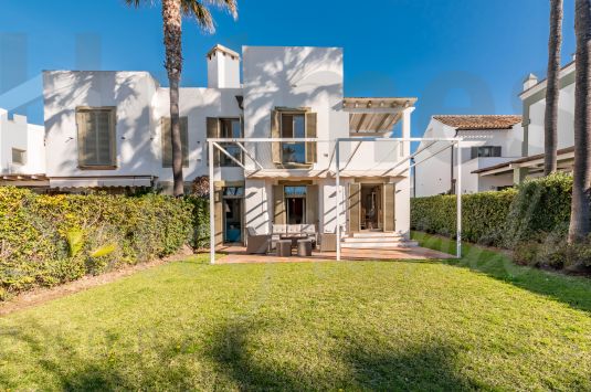 Fabulous south facing totally renovated townhouse with communal pool next to El Octogono Beach and Tennis Club and to the Real Club Marítimo.