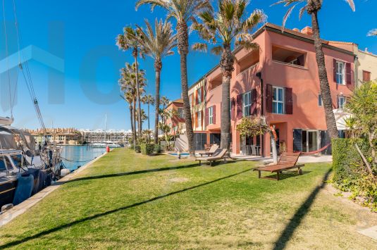 South-facing unique luxury waterfront corner house in the heart of the Sotogrande Marina.