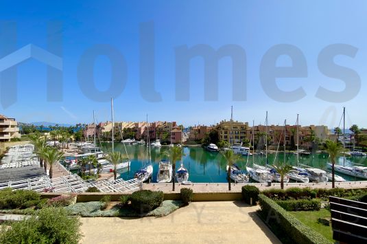A beautiful 2-bedroom apartment in a sought after, gated, modern apartment complex within Sotogrande Marina.