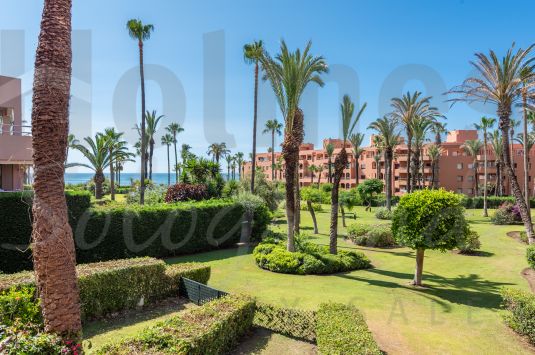 South-facing fully renovated 1st floor apartment with sea views in the highly popular Beach Apartments at Puerto Sotogrande.