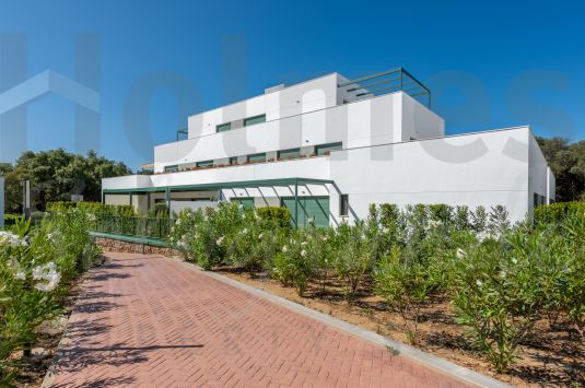 Southeast facing first floor apartment in Senda Chica close to La Reserva Golf &amp; Beach Clubs, the Sotogrande International School, the SO Sotogrande Hotel, supermarkets, shops and restaurants.
