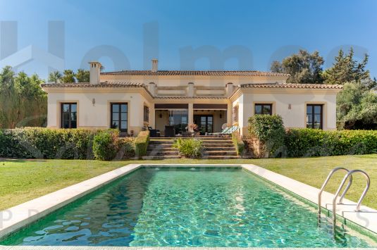 A substantial north facing villa with views to the Valderrama and La Reserva golf courses and the majestic Sierra Bermeja.