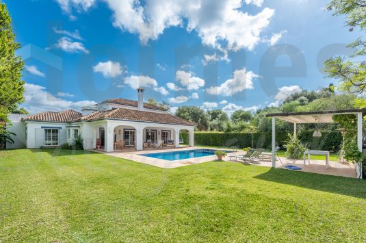 A lovely totally refurbished 2 storey villa located in a quiet area within Sotogrande Costa with a south facing garden and pool.
