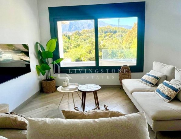 Contemporary Three-Bedroom Apartment in Estepona Town with Mountain Views