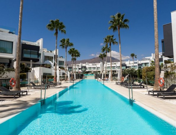 Modern Beachfront Townhouse with Stunning Sea Views in The Island, Estepona
