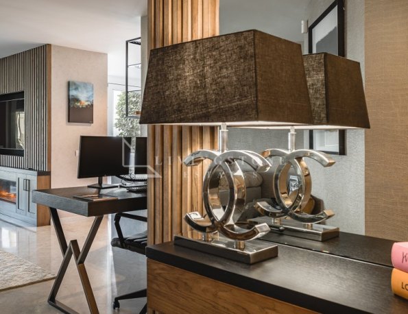 Fully renovated southwest-facing apartment in Japanese Gardens, Marina Puente Romano.