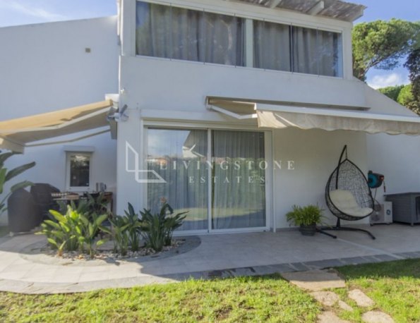 Recently Renovated Townhouse in Gated Complex with Pool and Gardens.
