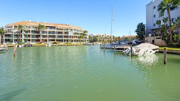 Canal-Side Apartment with Berth in Isla Carey, Sotogrande Marina