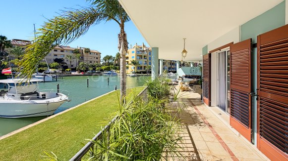 Canal-Side Apartment with Berth in Isla Carey, Sotogrande Marina