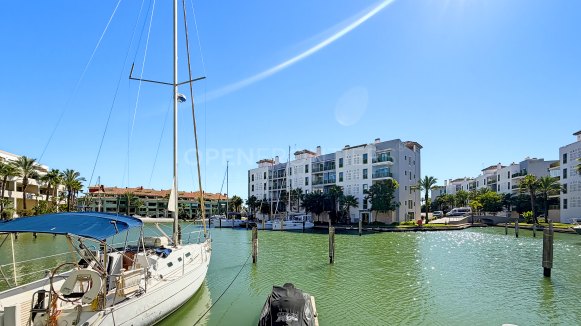 Canal-Side Apartment with Berth in Isla Carey, Sotogrande Marina