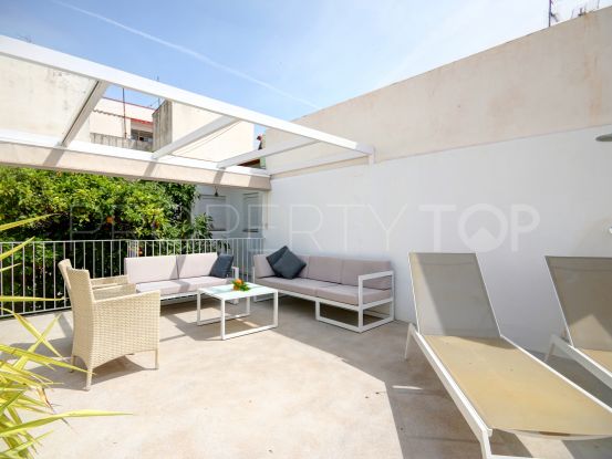 Townhouse with unique patio for sale in Estepona town