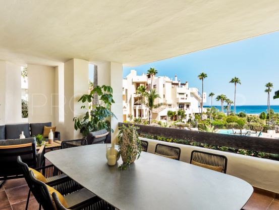 Beautifully refurbished apartment in gated beachfront community on the New Golden Mile!