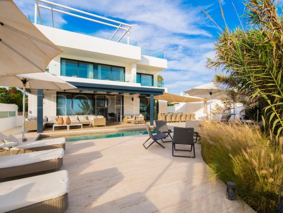 Spectacular frontline property set right on the Costa Bella beach