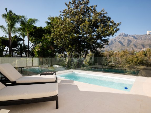 Fully furnished penthouse at EARTH on Marbella’s Golden Mile, with a private pool and ready to move into