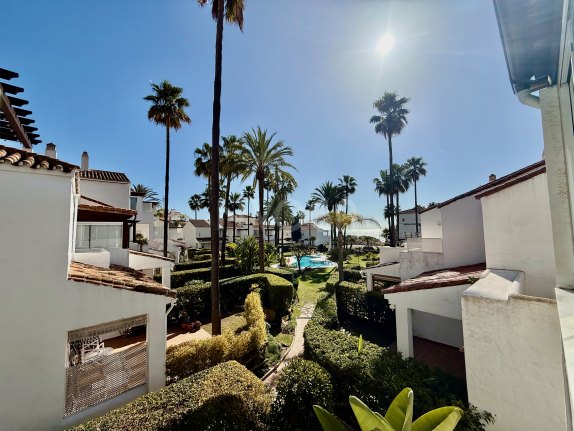 Magnificent front line beach townhouse, located in Bahia de Marbella, Marbella East.