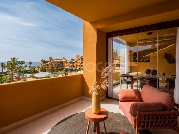 Luxury beachfront apartment with stunning Mediterranean views.