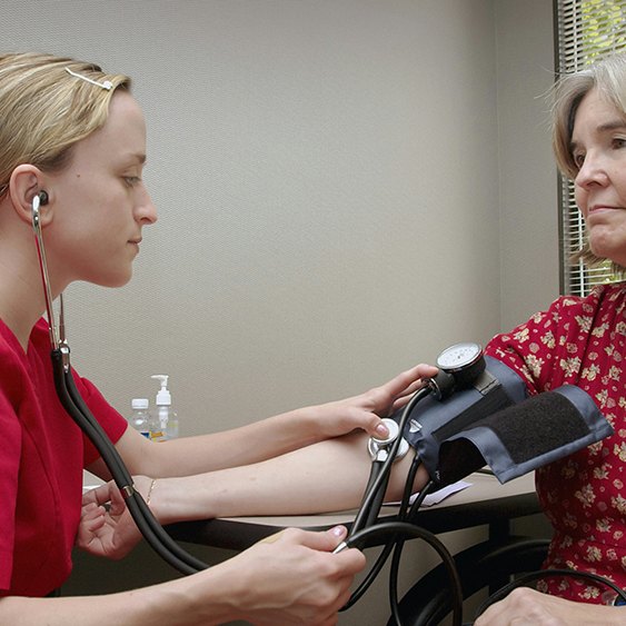 a health professional and a patient, featured image for the article