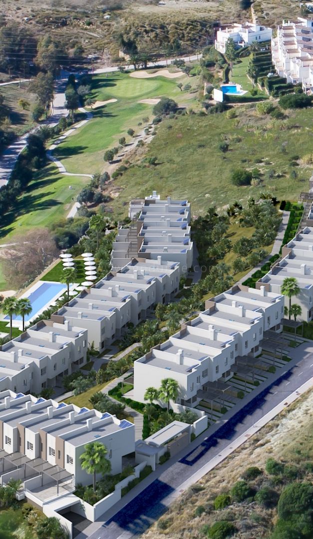 Modern townhouses in Estepona Golf with golf and sea views