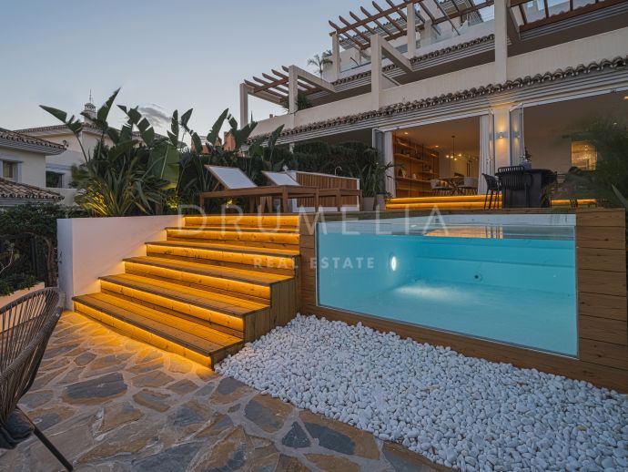 Elegante Erdgeschosswohnung mit atemberaubender Aussicht in Palacetes Los Belvederes, Nueva Andalucía