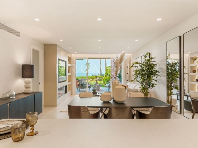 Renovated Modern luxury garden-level apartment in elite beachfront Cabo Bermejo, Estepona.