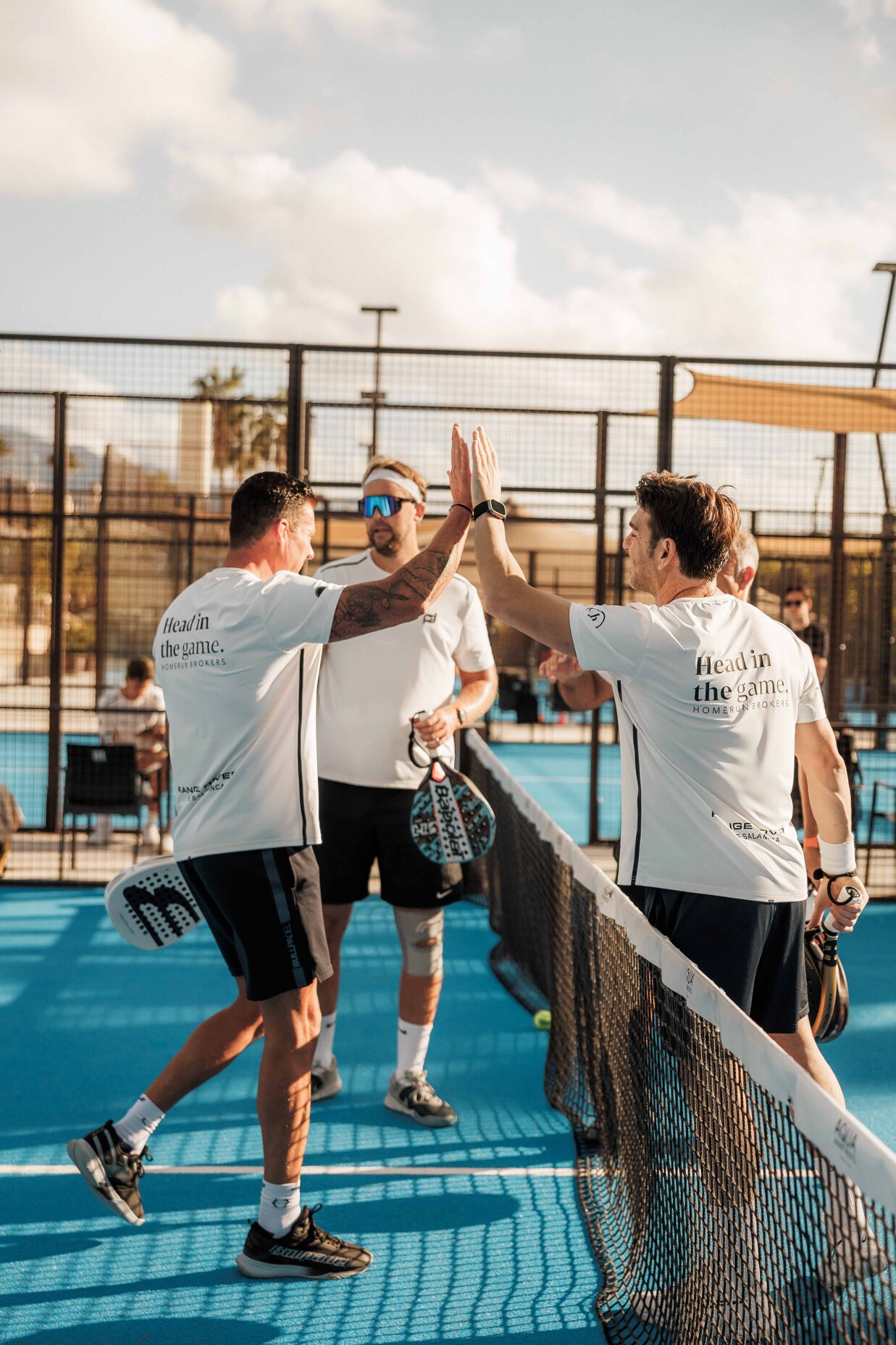 players finishing a game and being very sportive about it. 