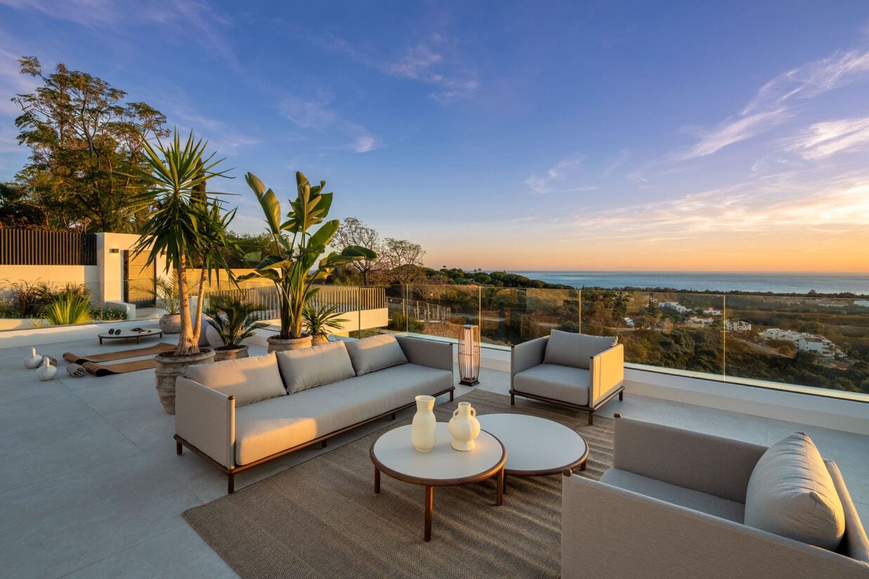 Rooftop view from Villa Ember, a Homerun development in Marbella, featuring panoramic sea views and contemporary sustainable design.