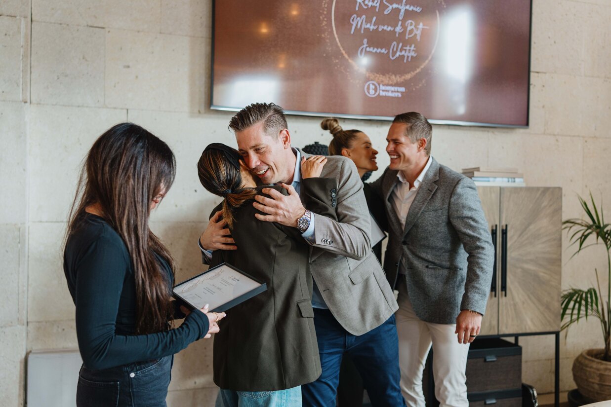 Our Head of sales Roger Widen and the agents celebrating the awards