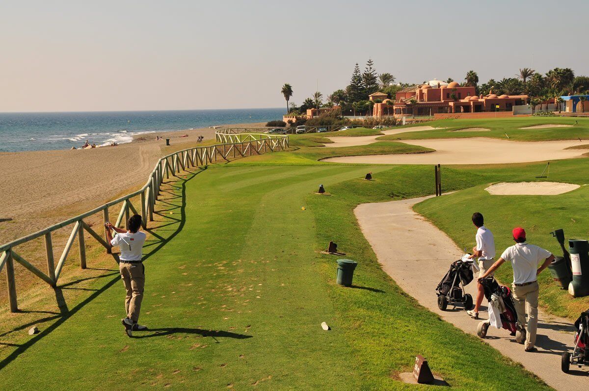 Golf course in Guadalmina Baja set beside the beach with sea views