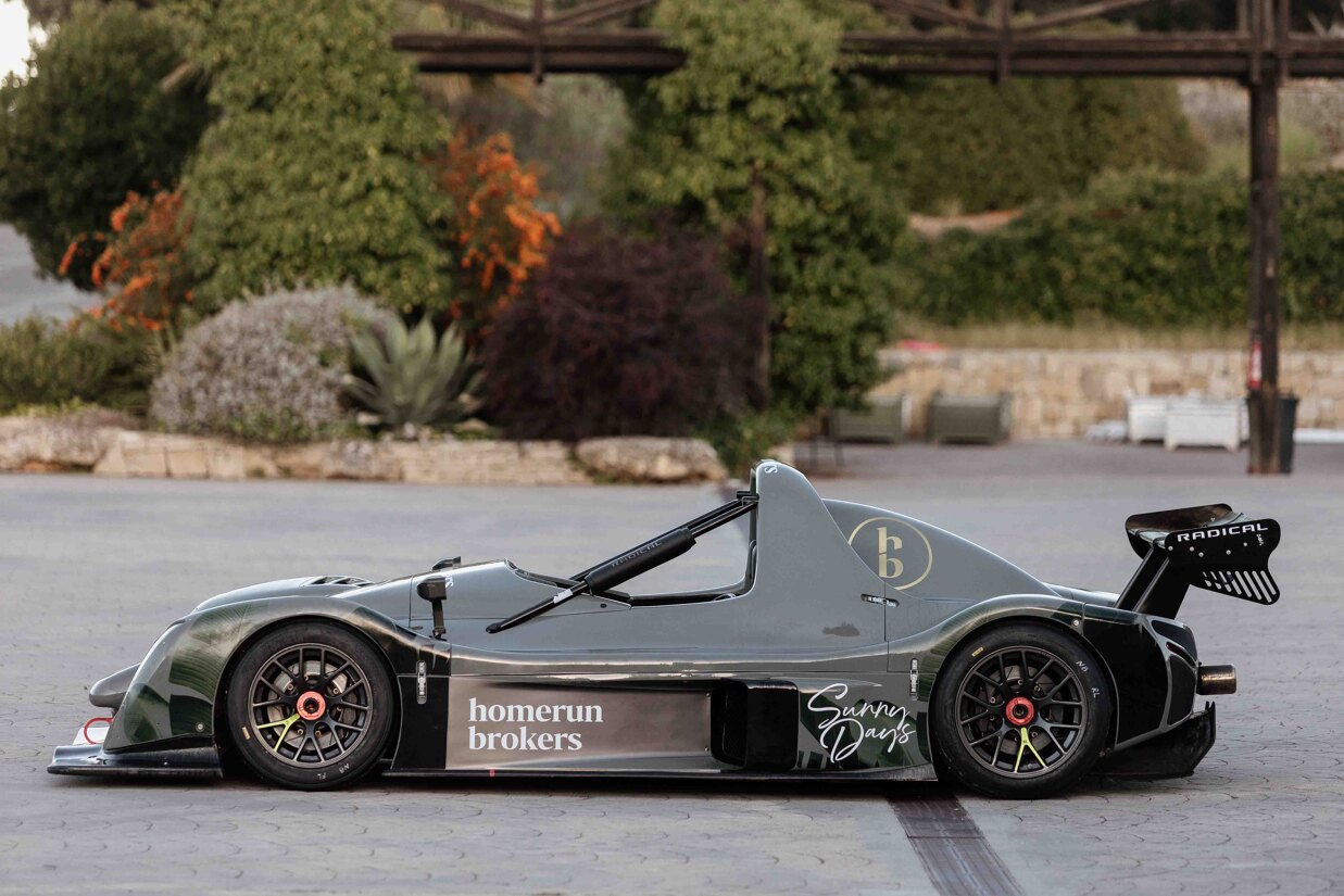 Customised racing car with Homerun Brokers at Ascari Racing Resport in Ronda Spain