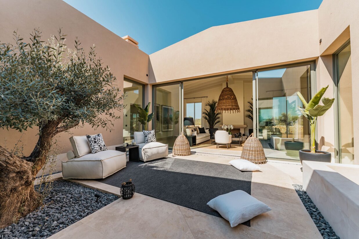 Son Rahaa luxury estate in Algaida Mallorca with pool, gardens, and integrated natural landscaping.