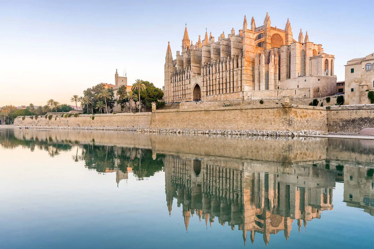 La Seu Cathedral reflect in the Mediterranean waters in Palma old town