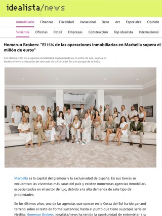 Homerun Brokers team posing in an elegant indoor space, dressed in professional attire.