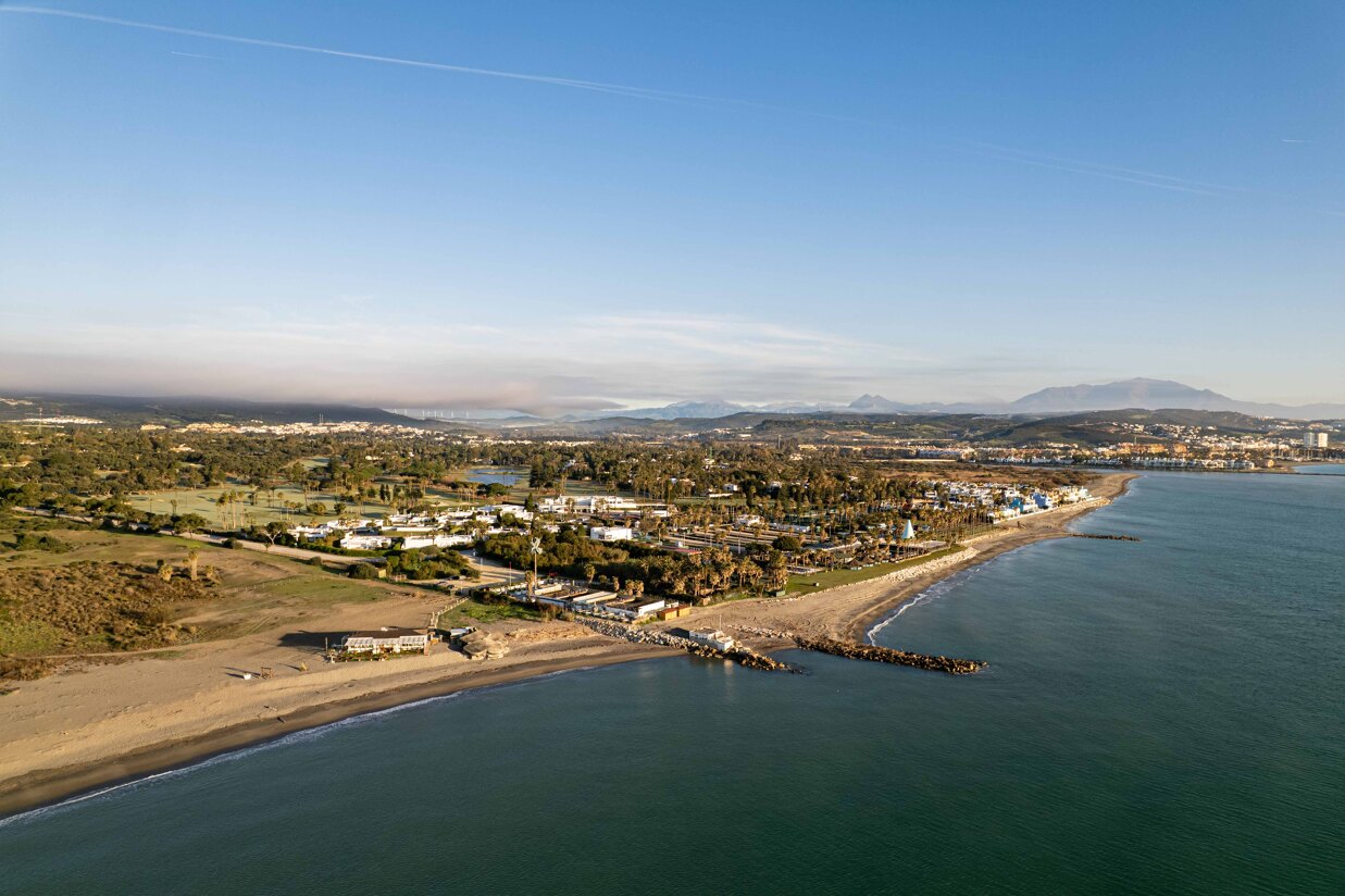 Aerial view of Sotogrande’s marina, showcasing the luxury yachts, waterfront villas, and the exclusive lifestyle of this prestigious coastal enclave.