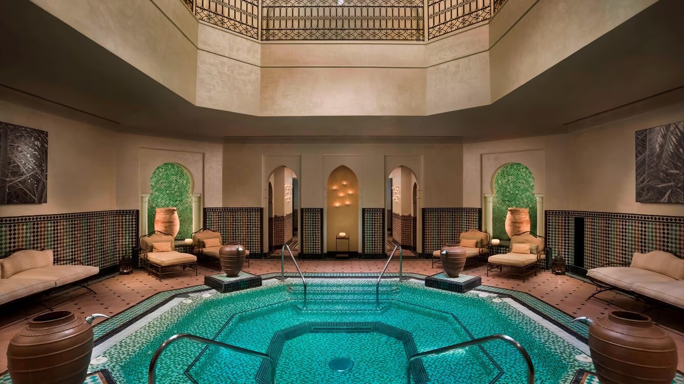 Moroccan-inspired spa at The Westin La Quinta, featuring an octagonal turquoise pool, arched doorways, and elegant relaxation areas.