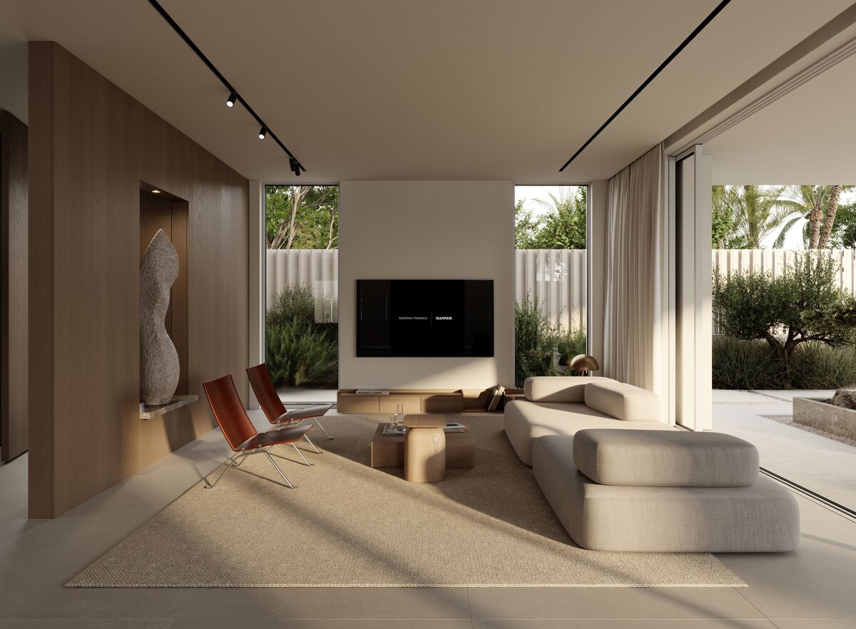 Modern living room in Banusana, Puerto Banús, with a neutral L-shaped sofa, wood paneling, sculptural artwork, and floor-to-ceiling glass doors opening to a private garden.