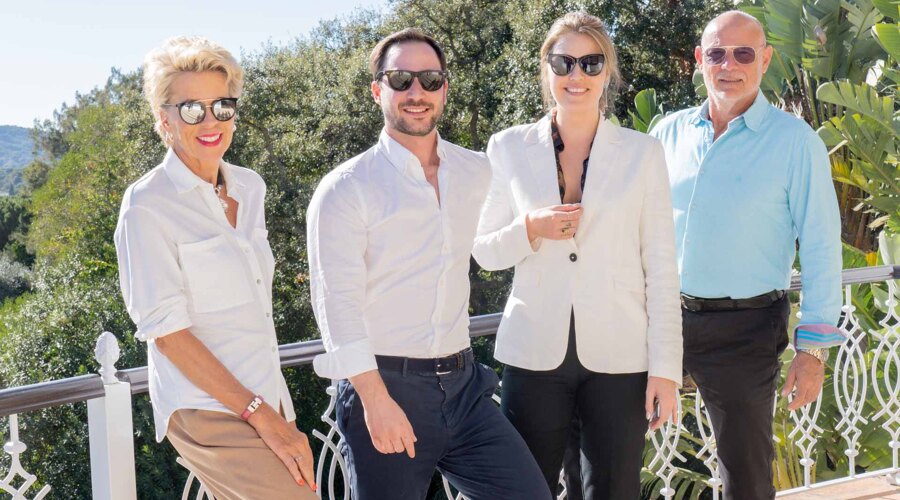 Stephanie Noll, Jorge Martí, Camila Schüler, Charles Gubbins at a sunny terrace from a Sotogrande Luxury Villa For Sale