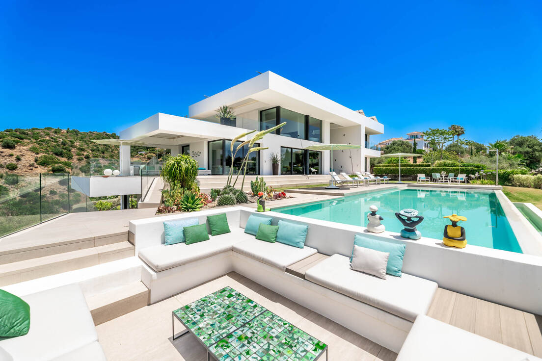 Luxury villa for sale in Nueva AndalucÃ­a, Marbella, with modern architecture and large swimming surrounded by nature