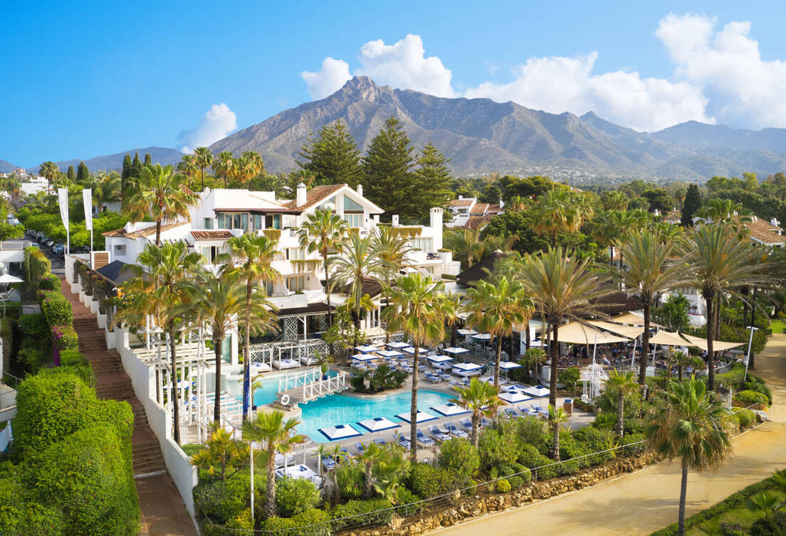 Puente Romano Beach Resort with La Concha Marbella mountain at the background