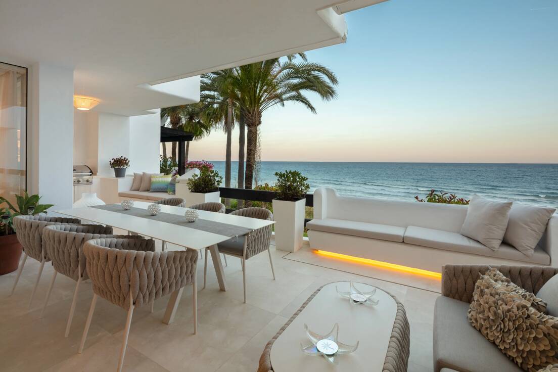 luxury terrace of penthouse in Marbella frontline beach, Costa del Sol