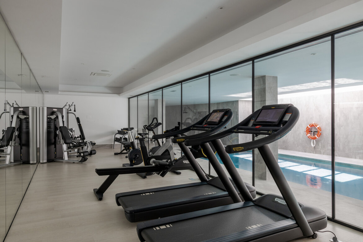 Gym and indoor pool at 9 Lions Residences