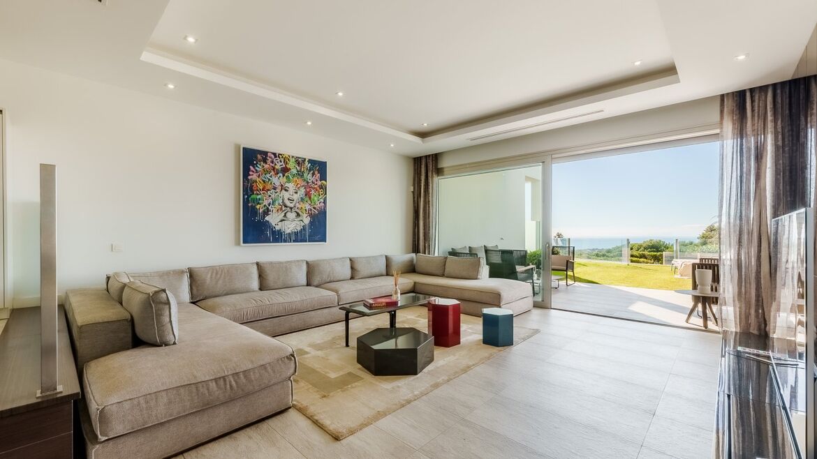 Contemporary living room with terrace in Vistas Marinas