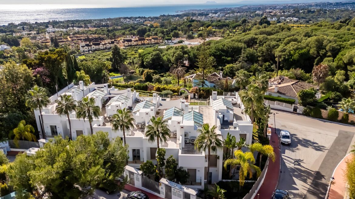 Aerial view of Vistas Marinas among the pines of Nagüeles
