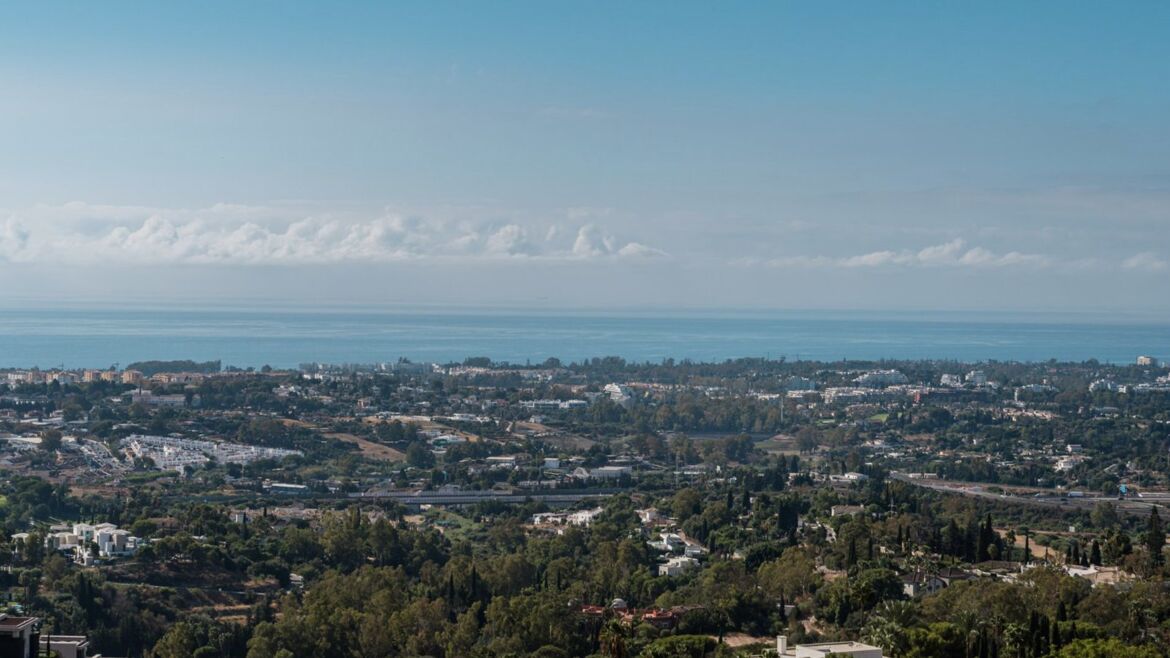 Panoramic view from Monte Halcones over the golf valley to the Mediterranean