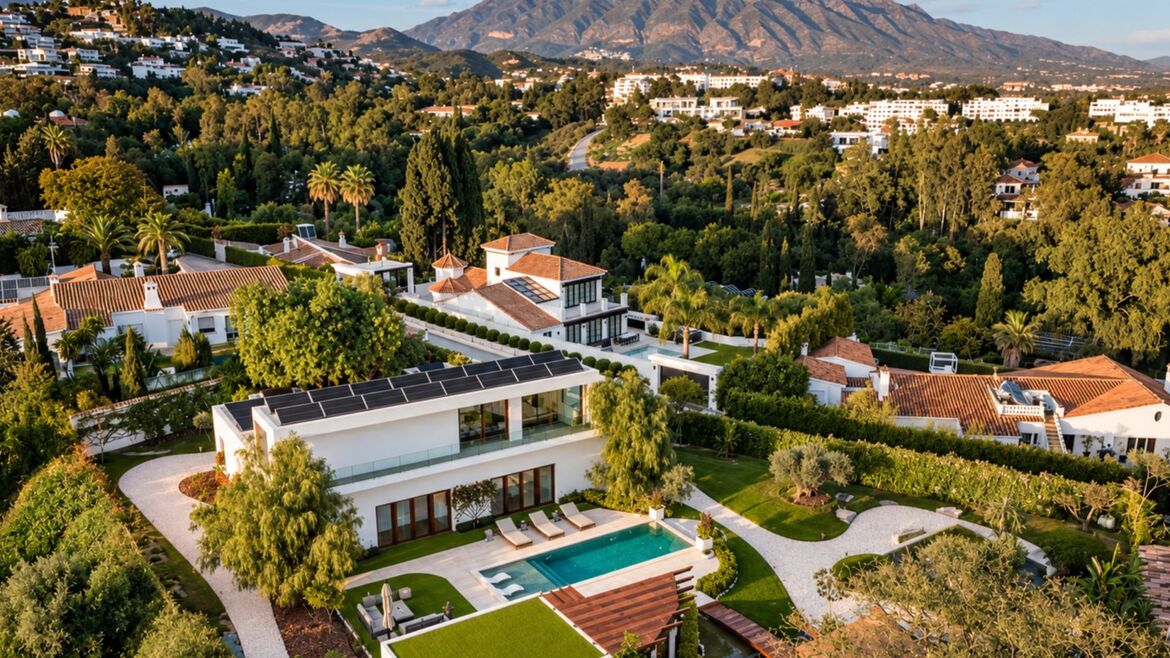 Aerial view of a modern villa in Monte Halcones with La Concha behind