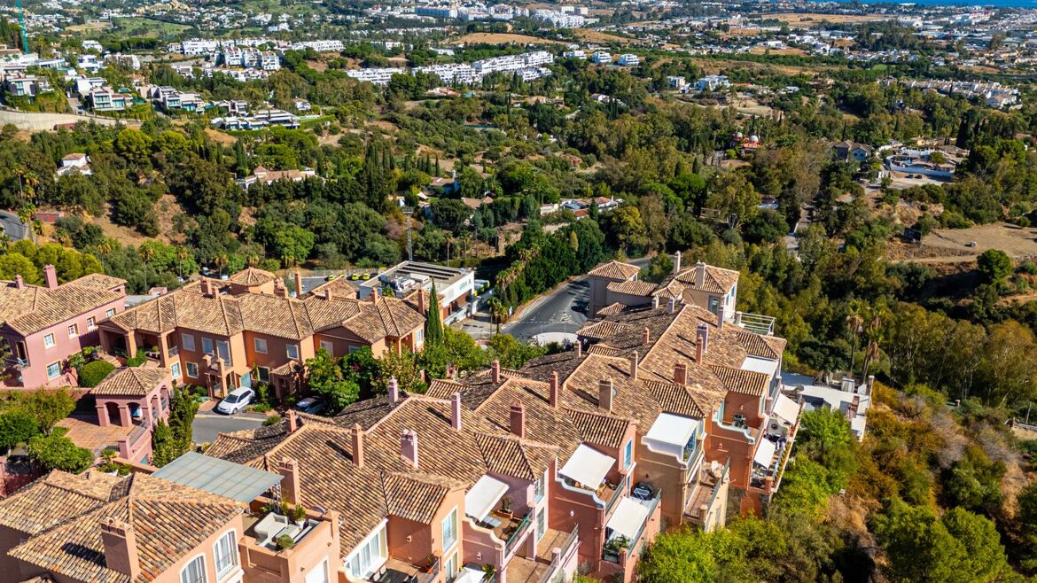Aerial view of the Monte Halcones hillside complexes down to the sea